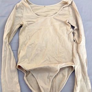 Flesh colored body suit.  Never worn